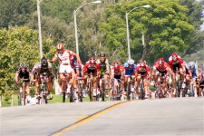 ...but Rahsaan Bahati sneeks past Cantwell on the right. ADM continues the sprint in background. Paramount Racing Criterium - Sunday, 06 JUL 2008